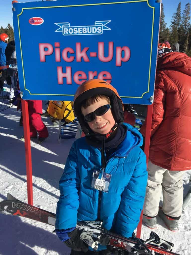 This is a happy kid after his two-hour lesson at Mt. Rose Ski Tahoe, carful of kids, family friendly ski destination