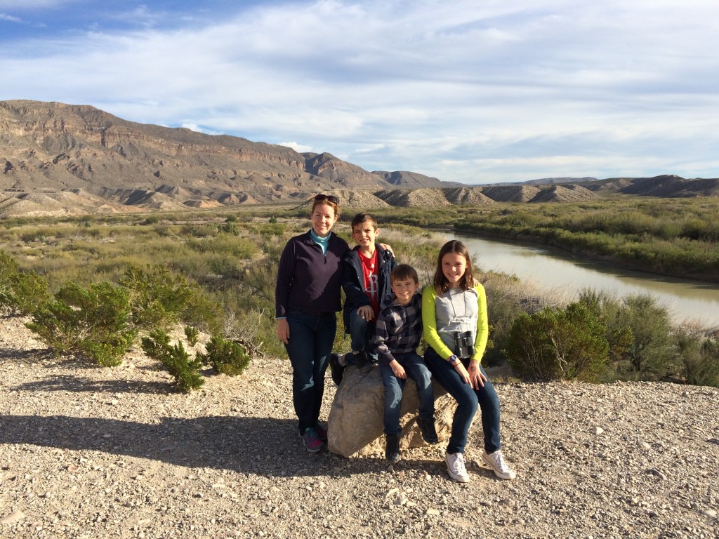 At the Boquillas Del Carmen overlook, the carful of kids take in the view of Mexico and beyond. Big Bend National Park, west texas for kids