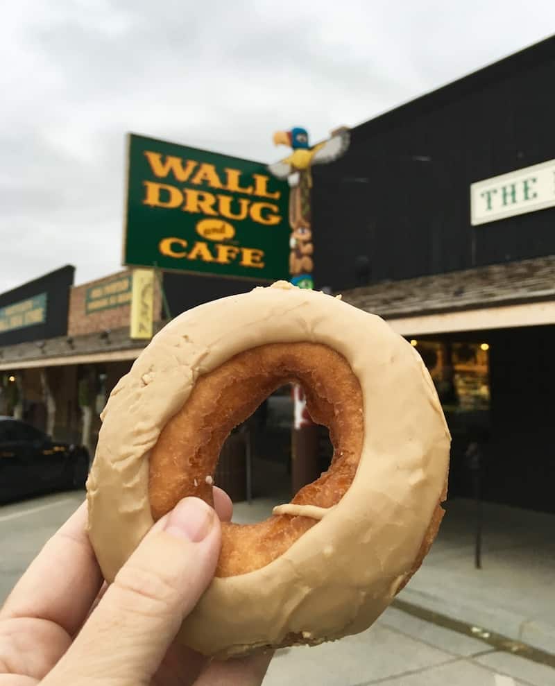 Enjoy a fresh donut at Wall Drug Store in South Dakota.