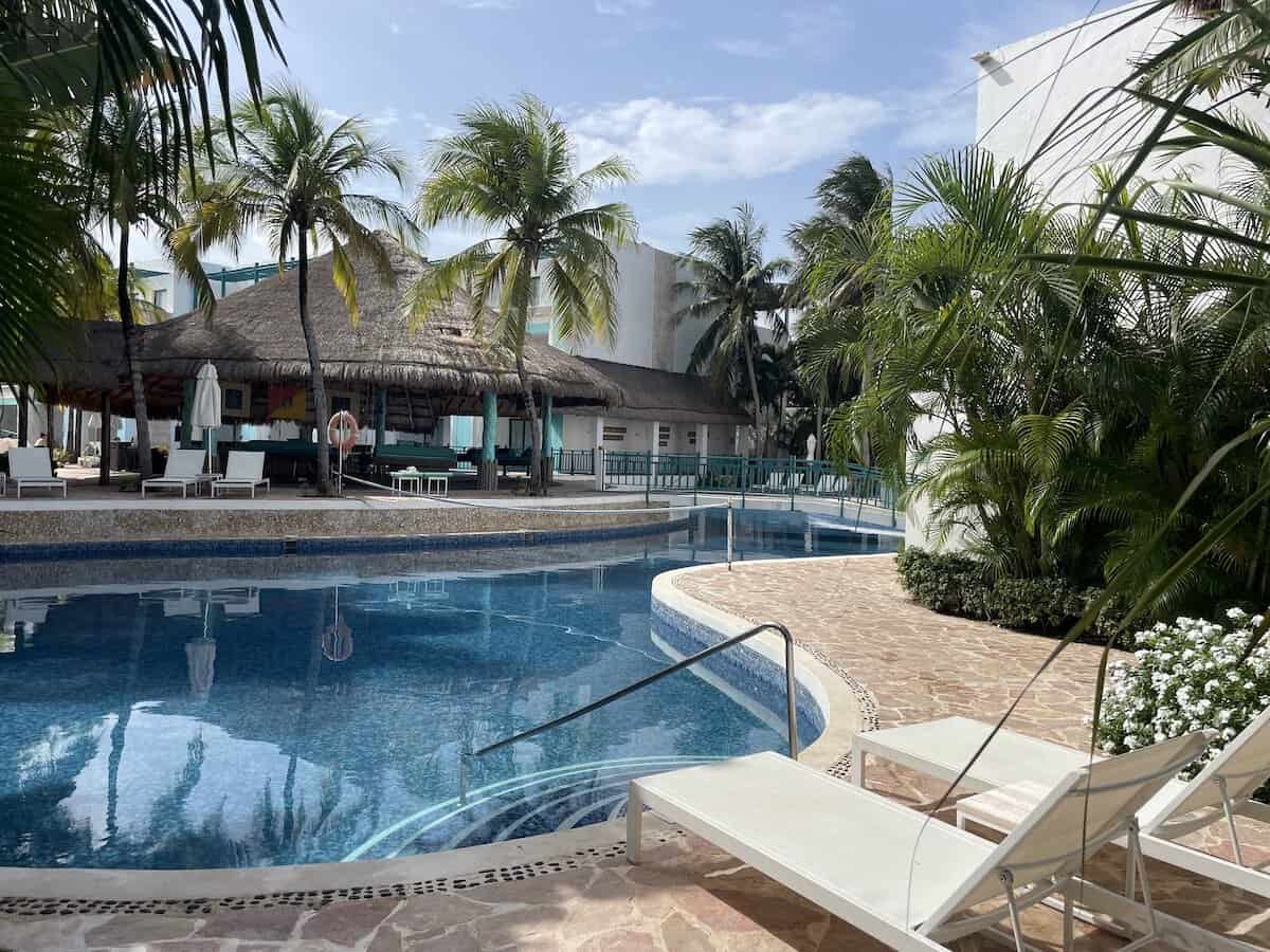 The SOS pool area is offers a swim up bar, volleyball 