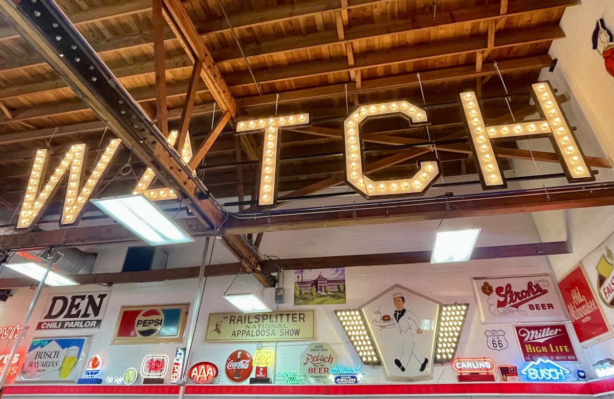 collection of vintage signs at the Ace Sign Co.