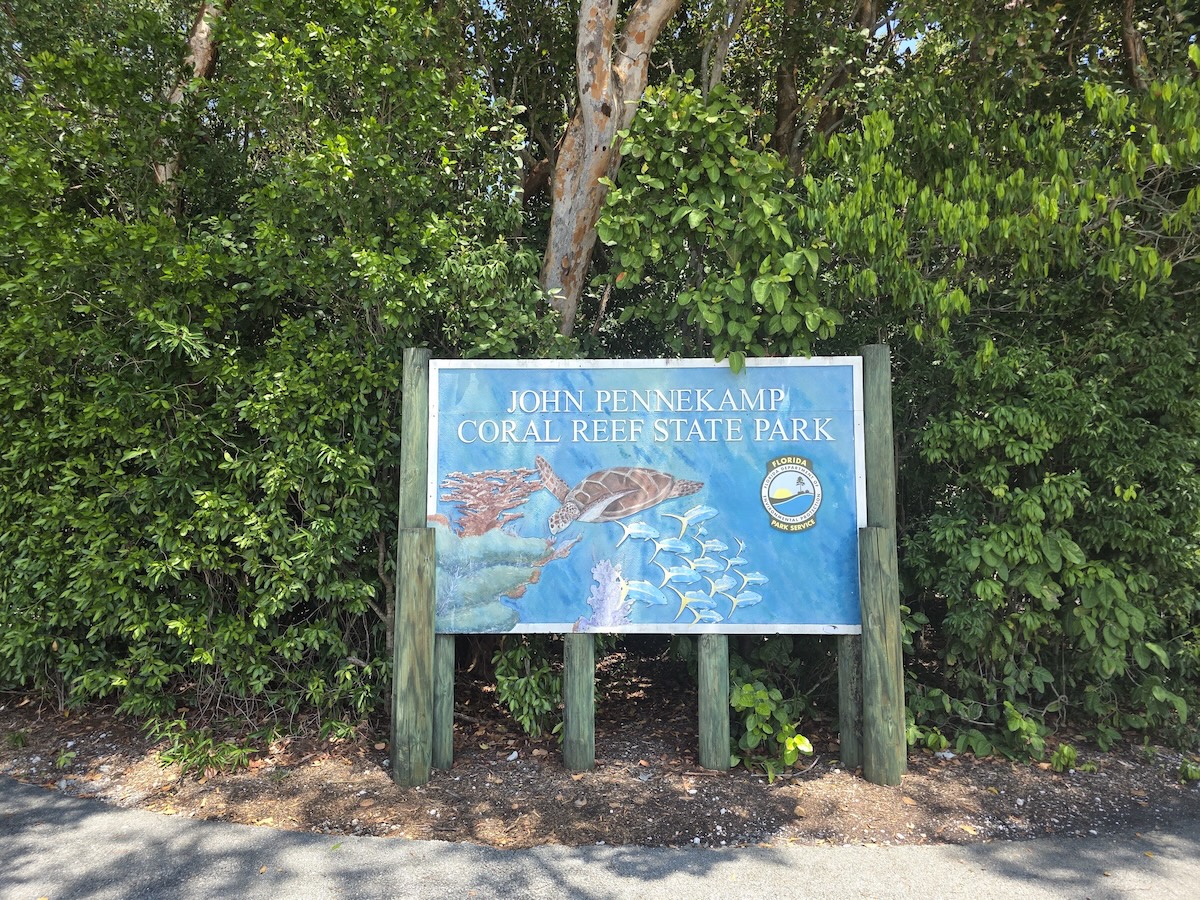 Entrance sign to John Pennekamp Coral Reef State Park.